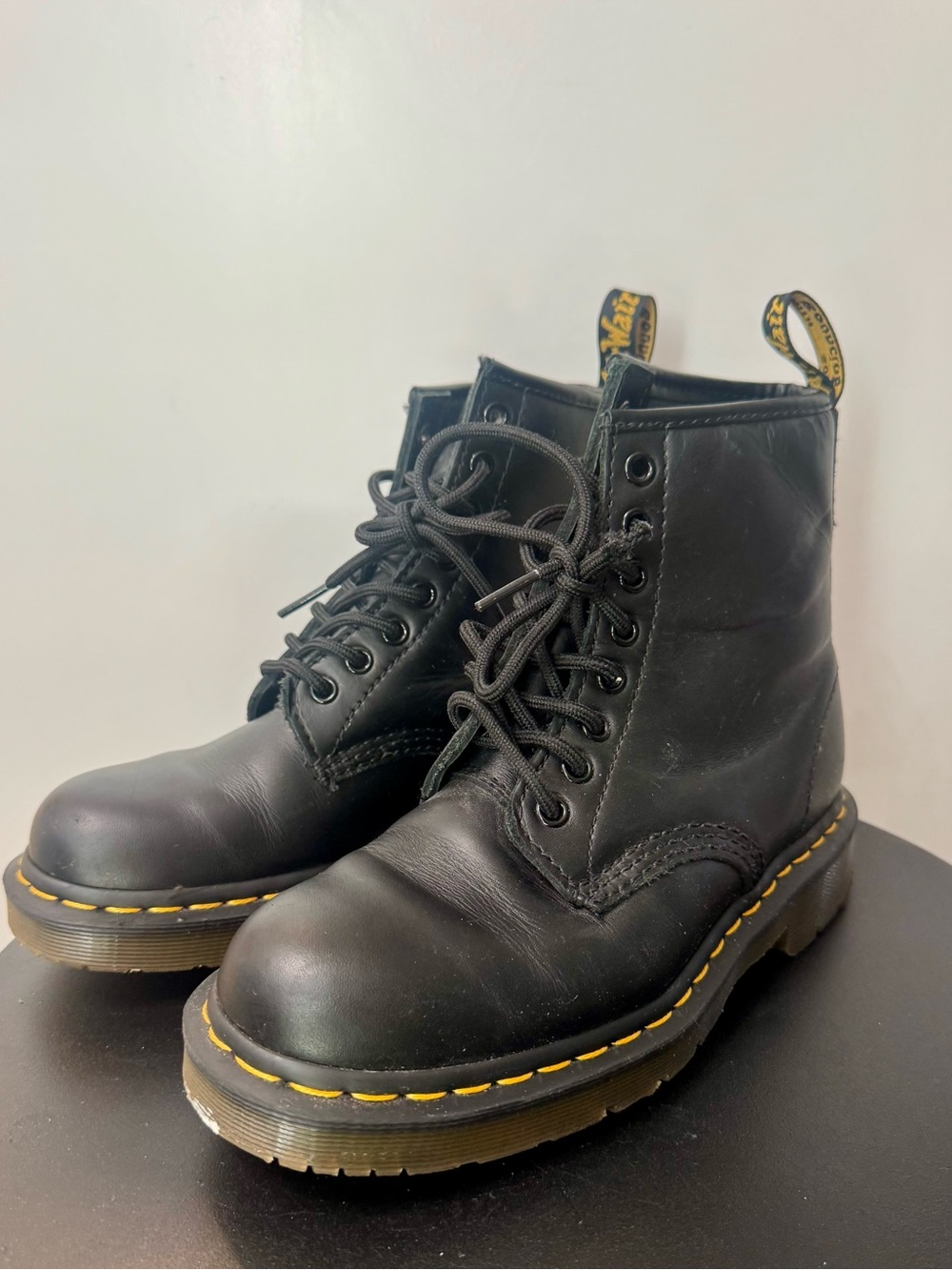dr martens airwair with bouncing soles and yellow stitching